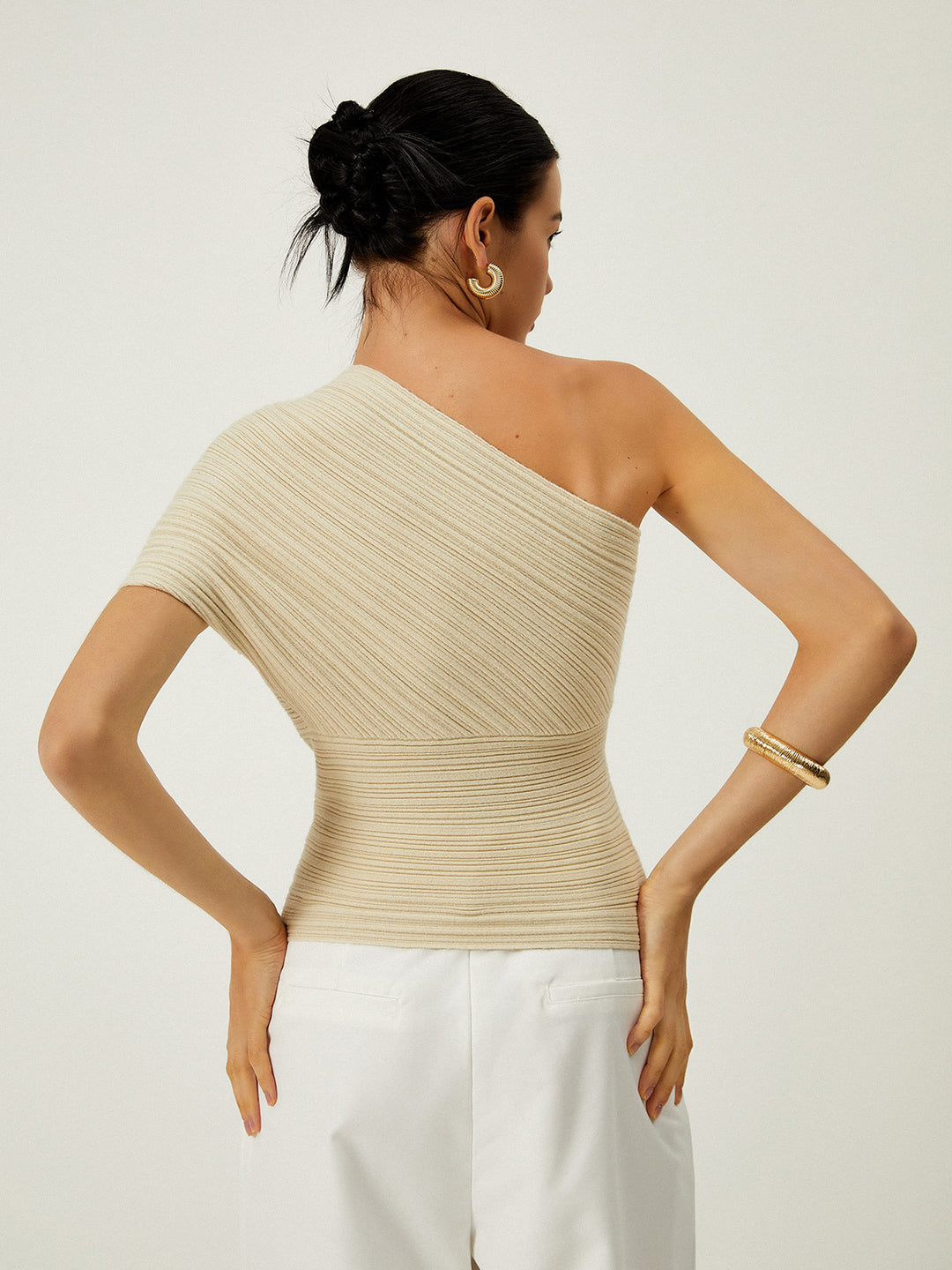 Asymmetrical ribbed top with button detail