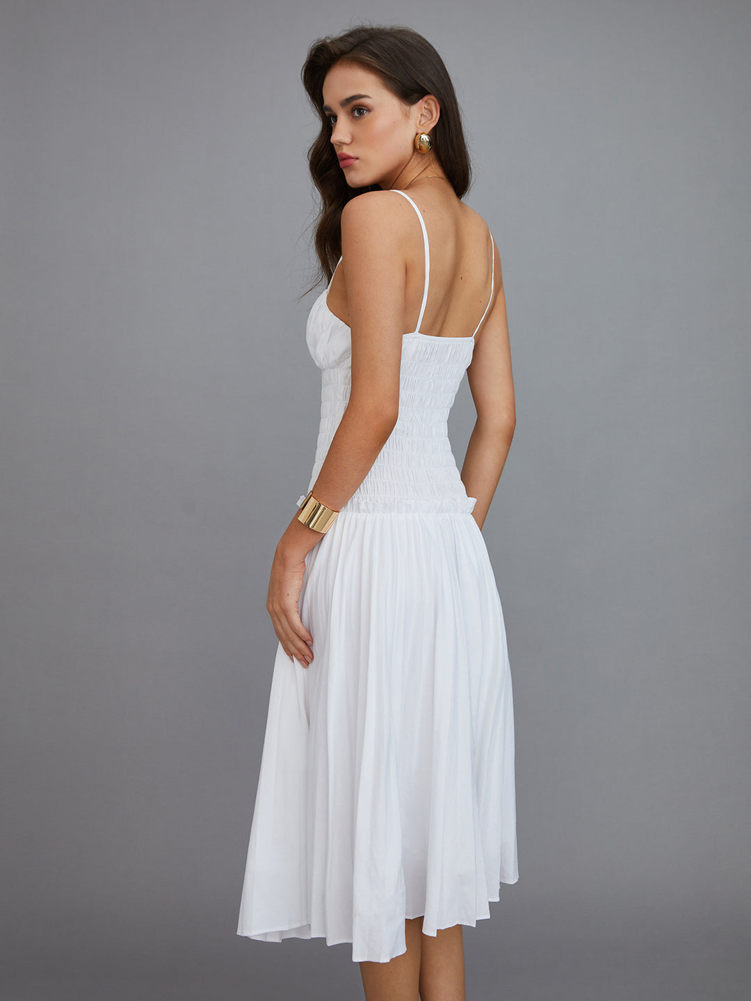 White pleated midi dress with thin straps
