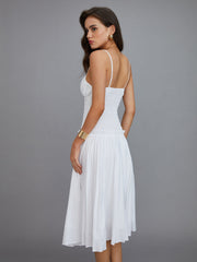 White pleated midi dress with thin straps