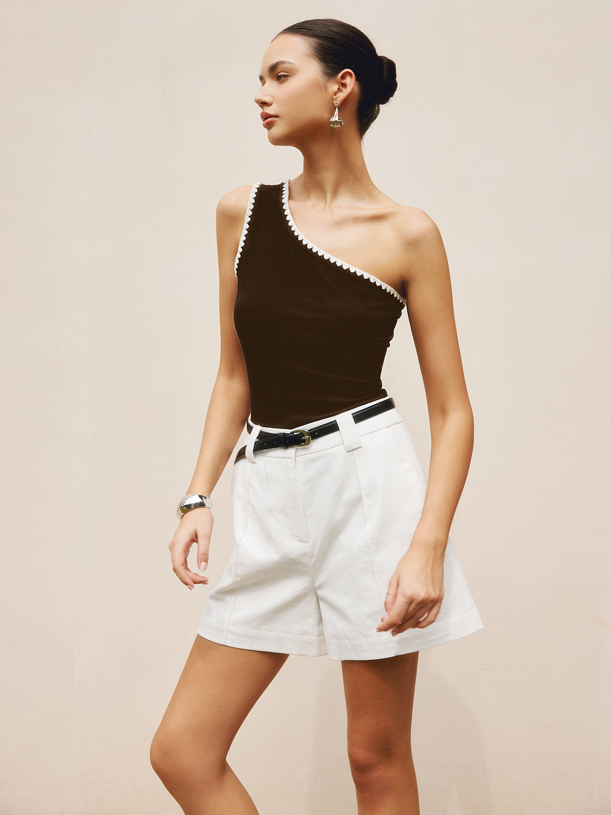 Black top with one shoulder and white trim