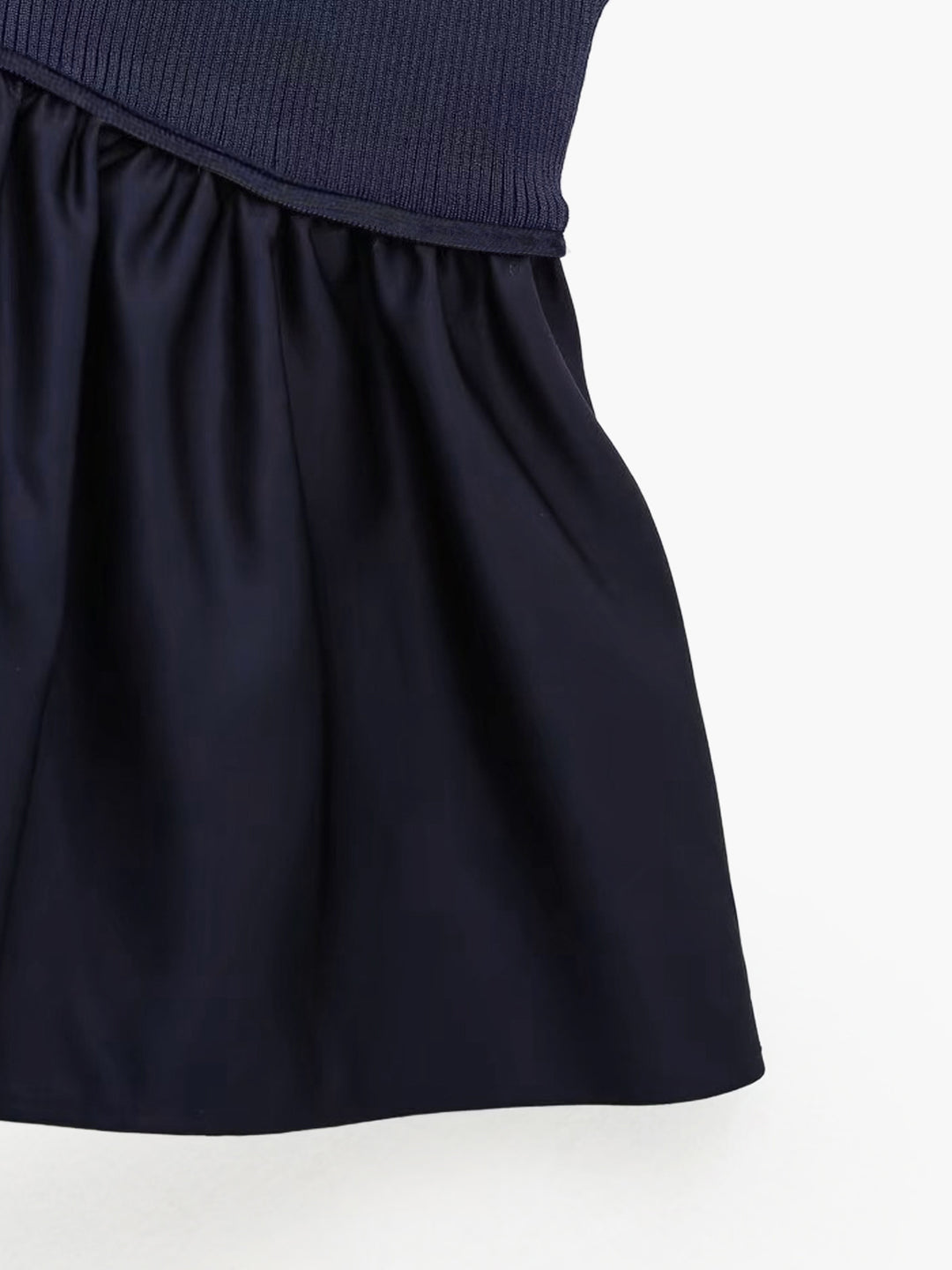 Spaghetti strap top with pleated skirt