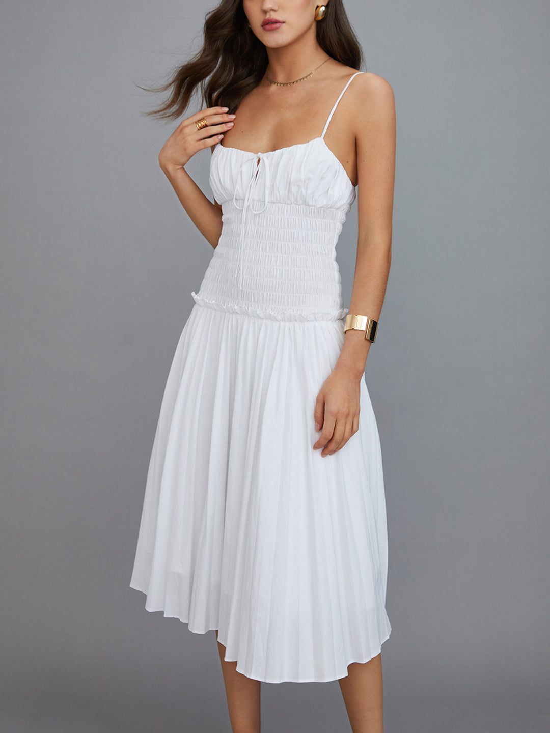 White pleated midi dress with thin straps