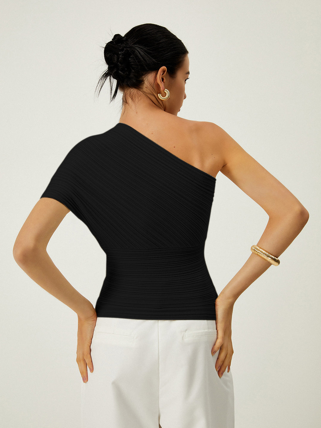 Asymmetrical ribbed top with button detail