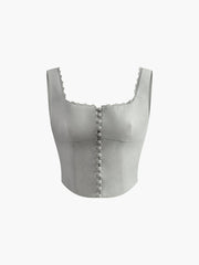 White corset top with button details and lace trim