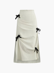 White midi skirt with black bow details