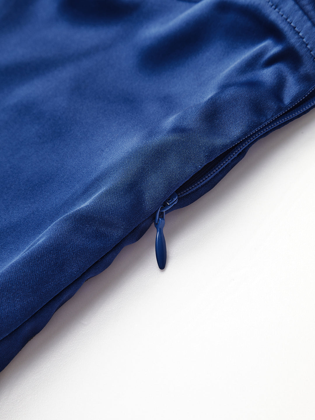 Blue satin top with bow straps and cutout