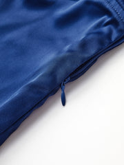 Blue satin top with bow straps and cutout