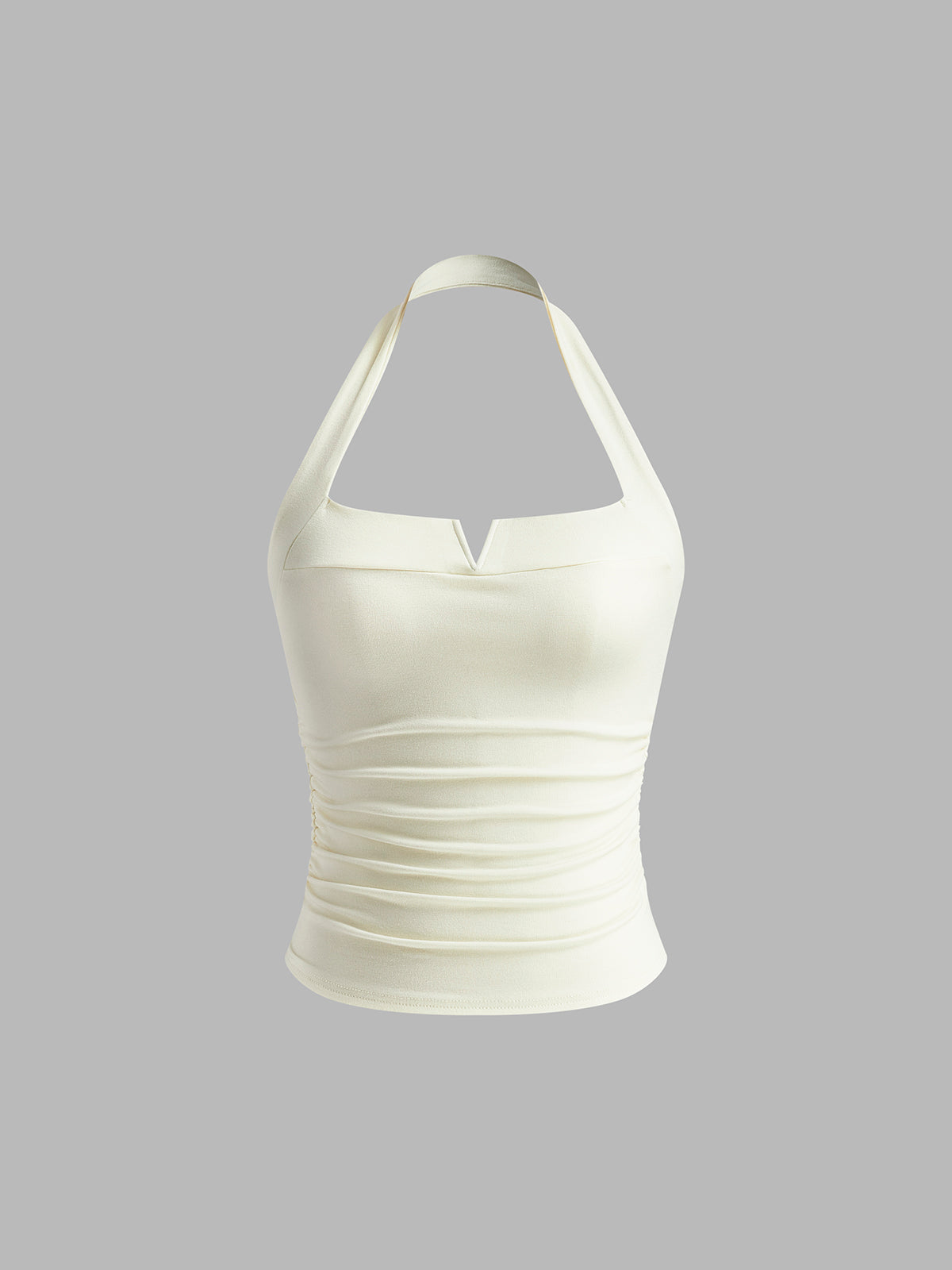 White backless top with ruffle details