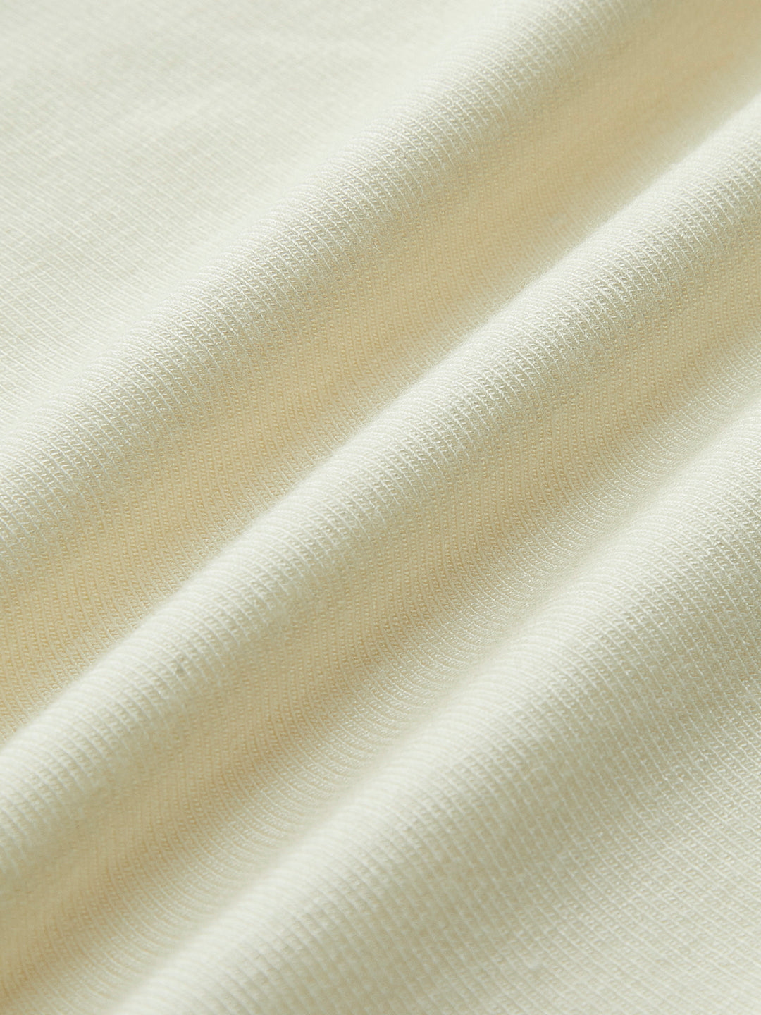 White backless top with ruffle details