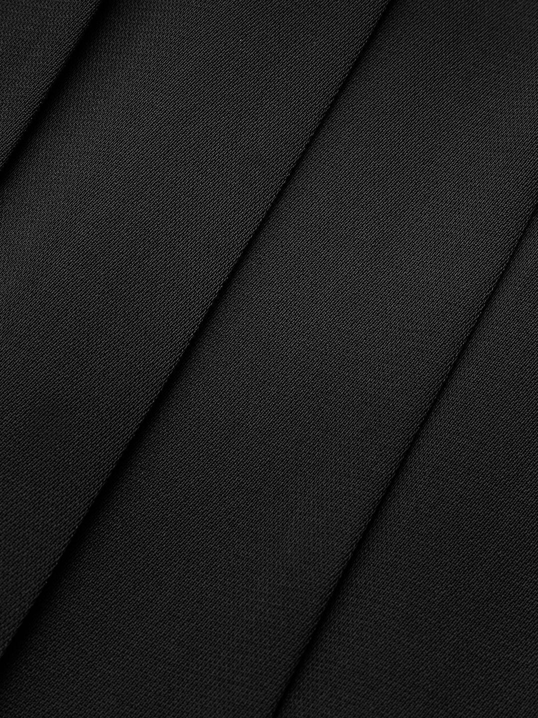 Pleated midi skirt with asymmetrical faux leather yoke