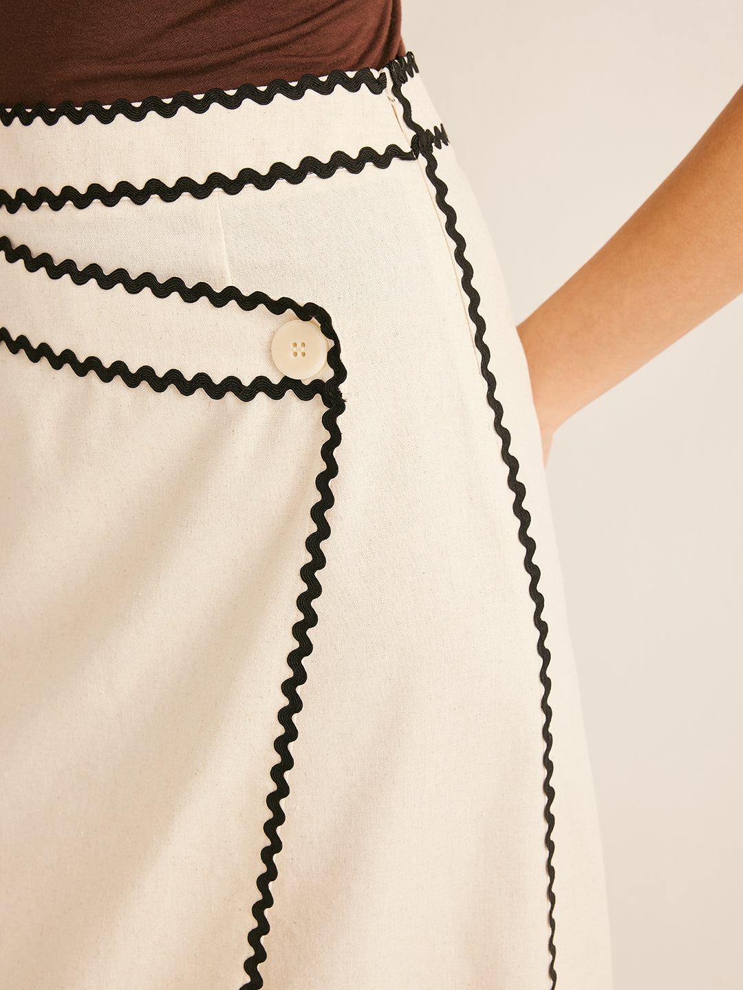 Cream flared midi skirt with contrasting trim