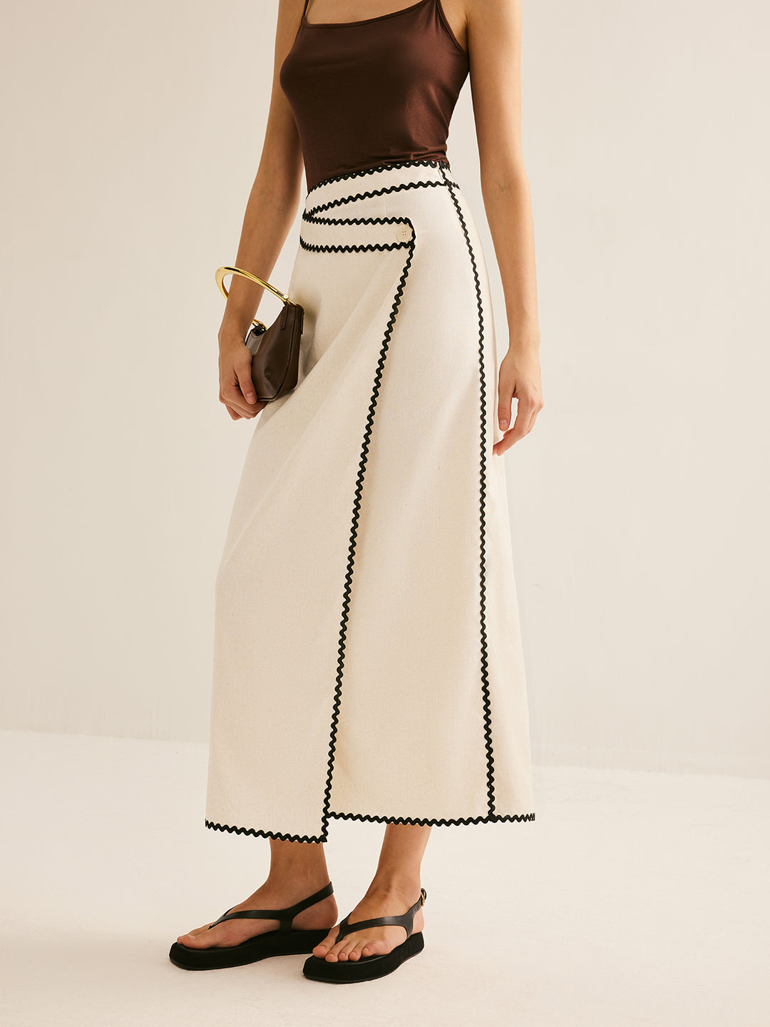 Cream flared midi skirt with contrasting trim