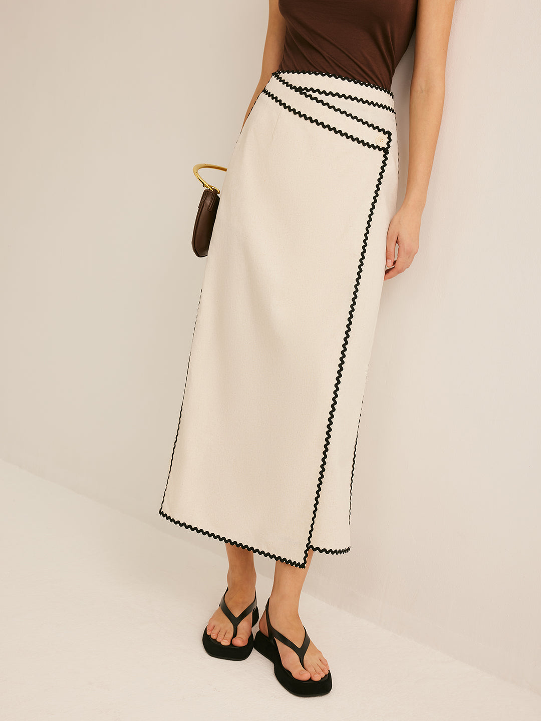 Cream flared midi skirt with contrasting trim