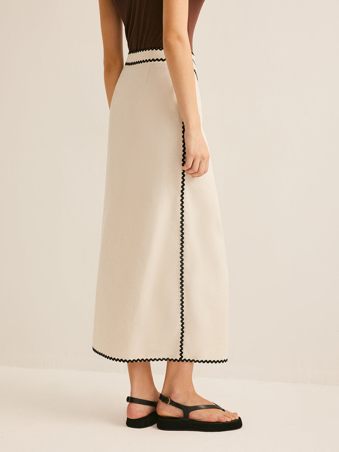 Cream flared midi skirt with contrasting trim