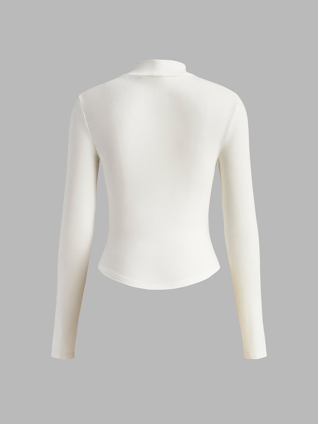 White fitted top with long sleeves and corset details
