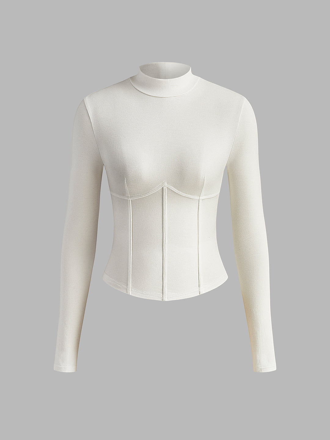 White fitted top with long sleeves and corset details