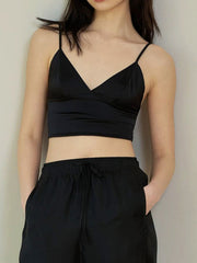 Black satin top with thin straps and V-neck