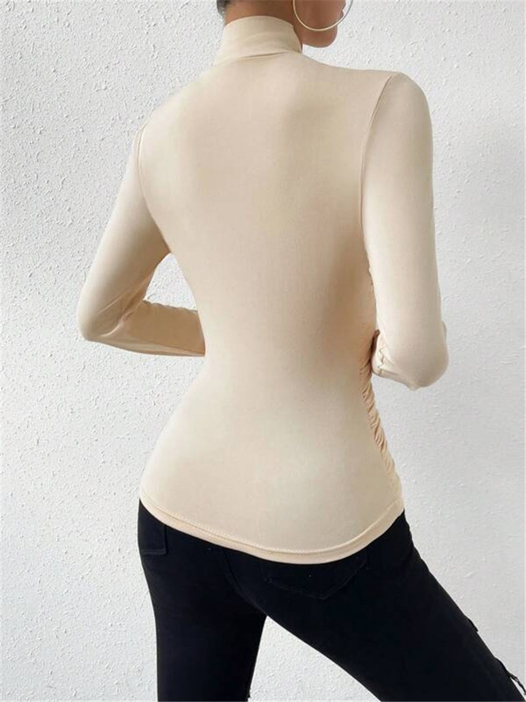 Fitted top with draped neckline