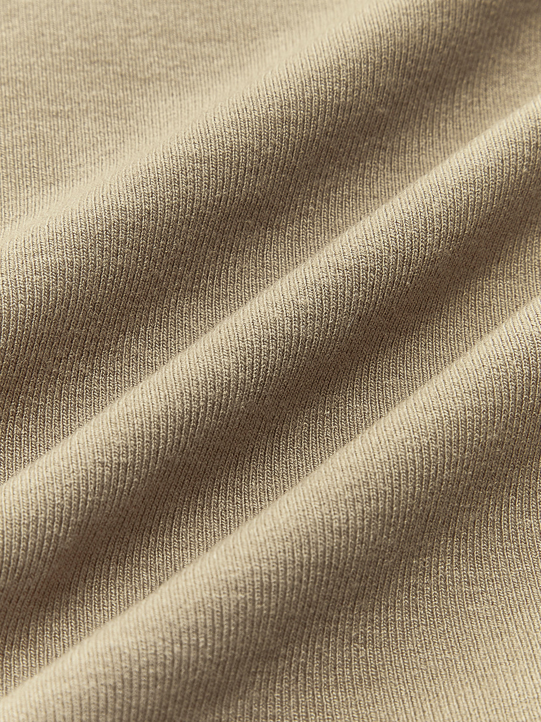 Seamless top with long sleeves and asymmetrical neckline