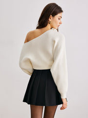 Black pleated mini skirt