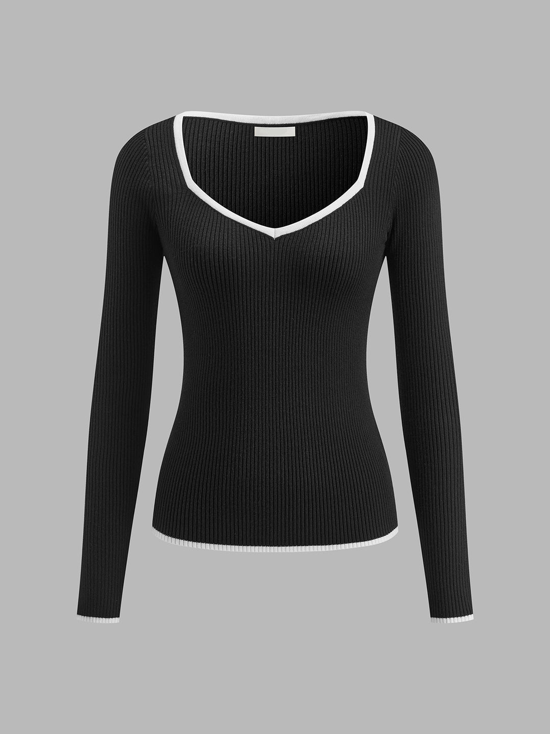Ribbed top with long sleeves, contrast trim and V-neck