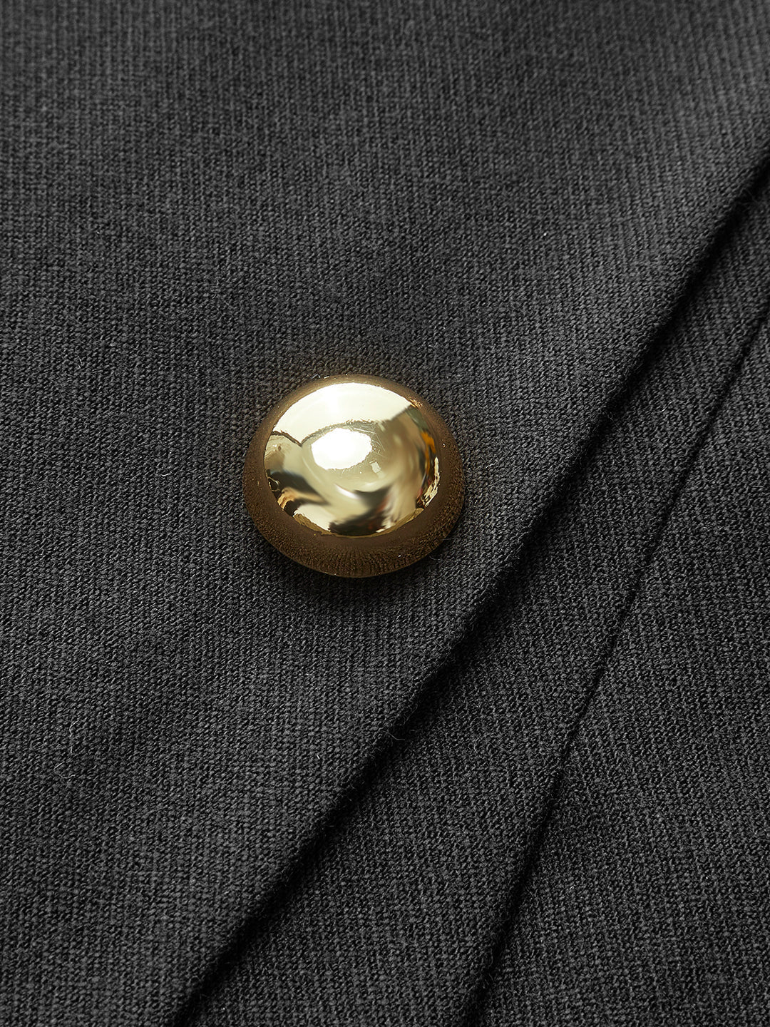 Pleated mini dress with decorative buttons