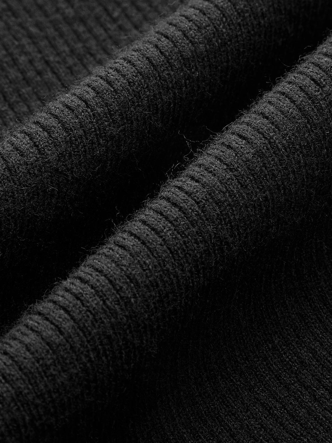 Sleeveless ribbed top with fishnet details