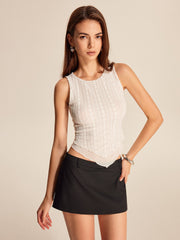 White lace top with pointed peplum