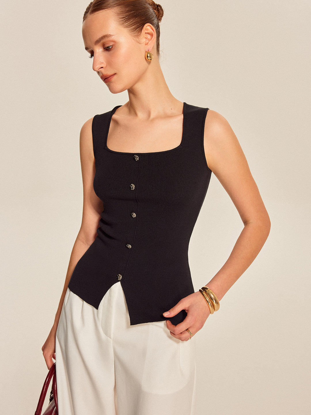 Black ribbed sleeveless top with buttons