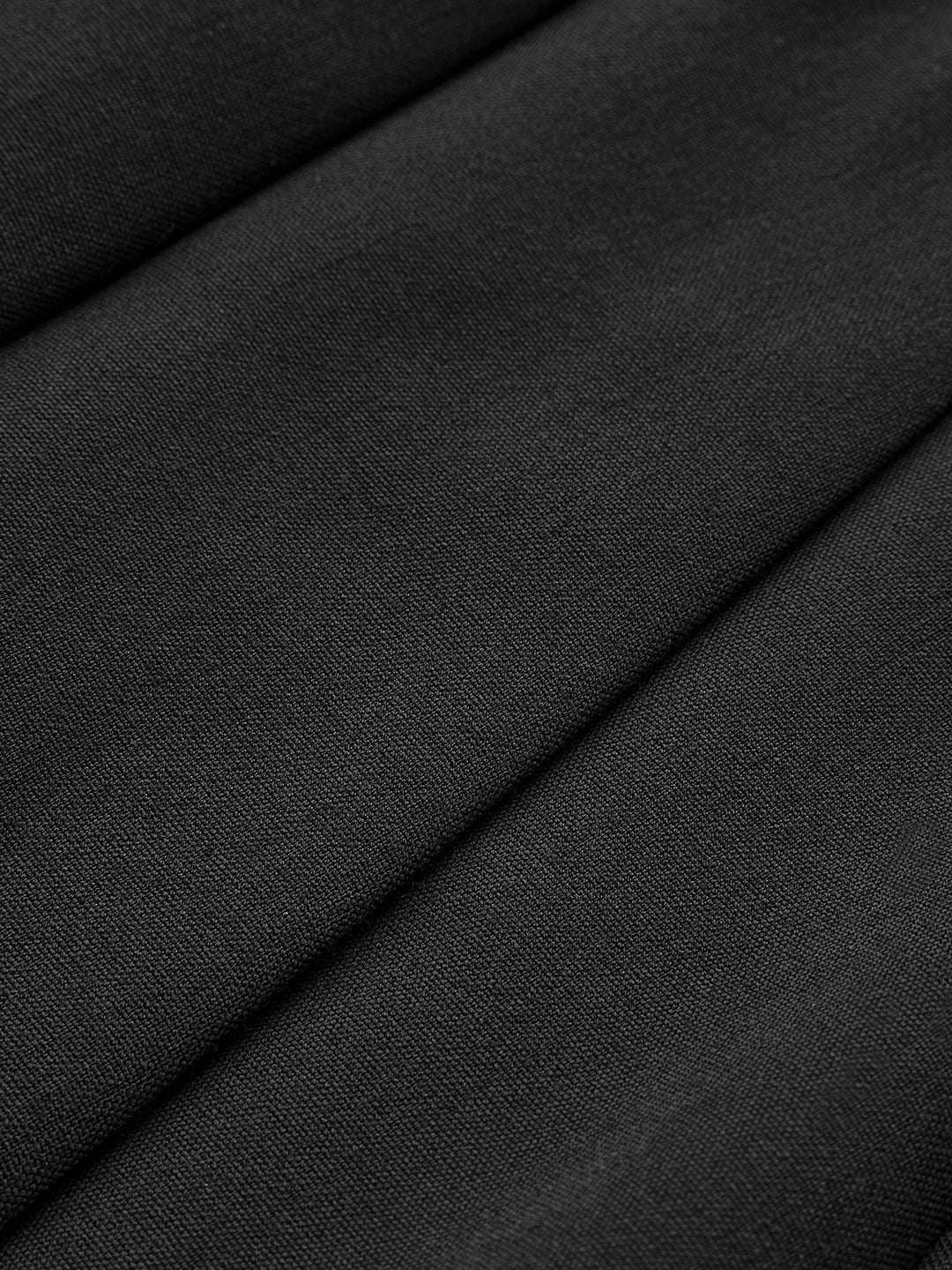 Black pleated mini skirt