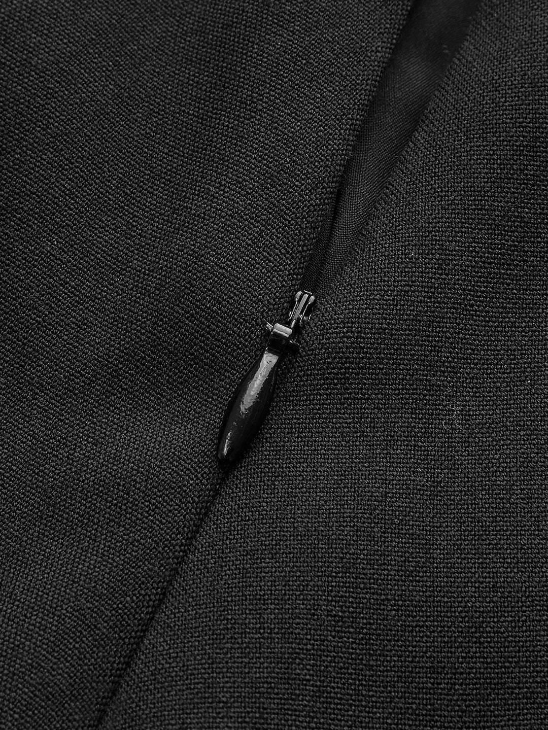 Black pleated mini skirt