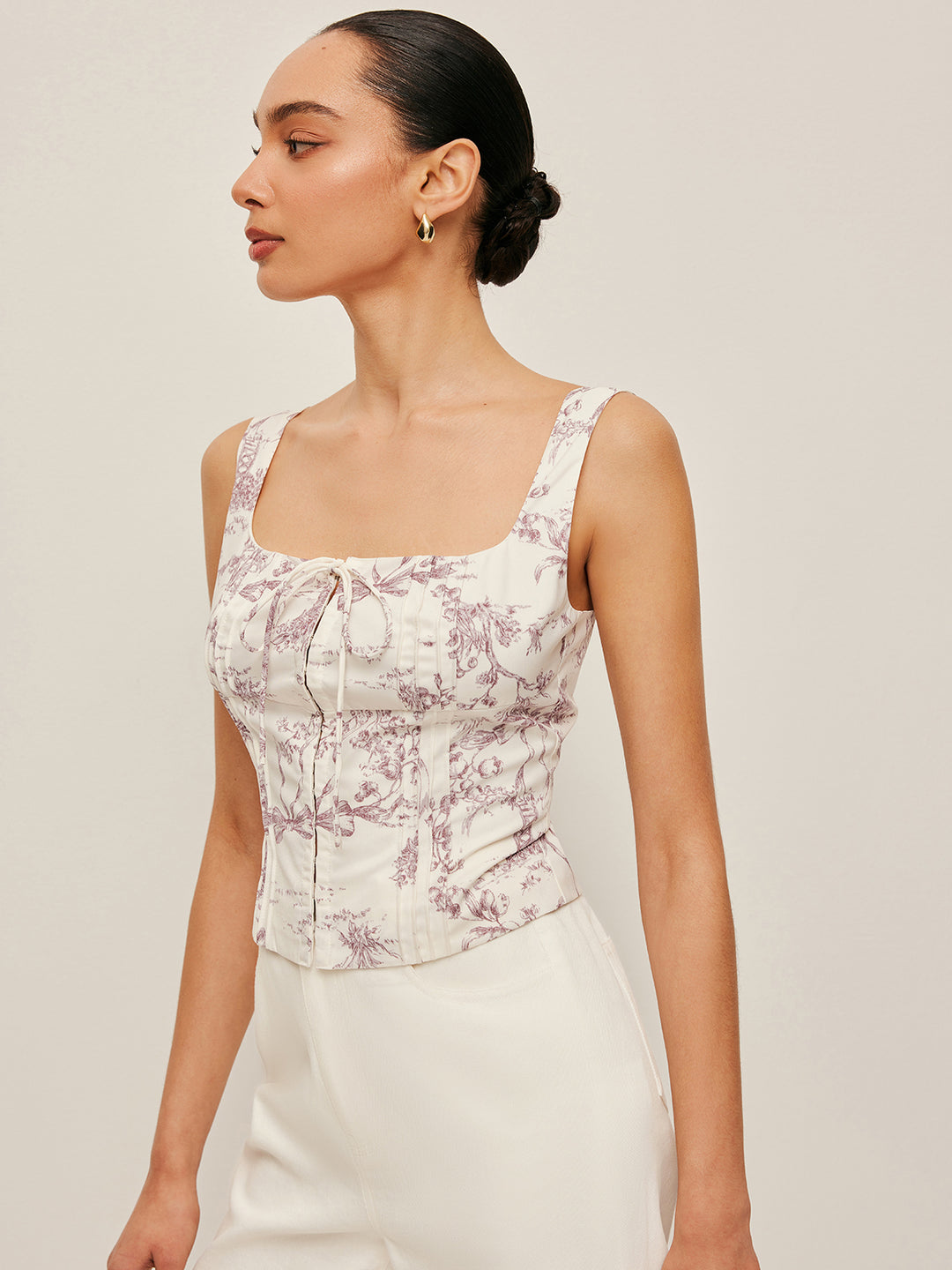 Patterned top with bow and square neckline