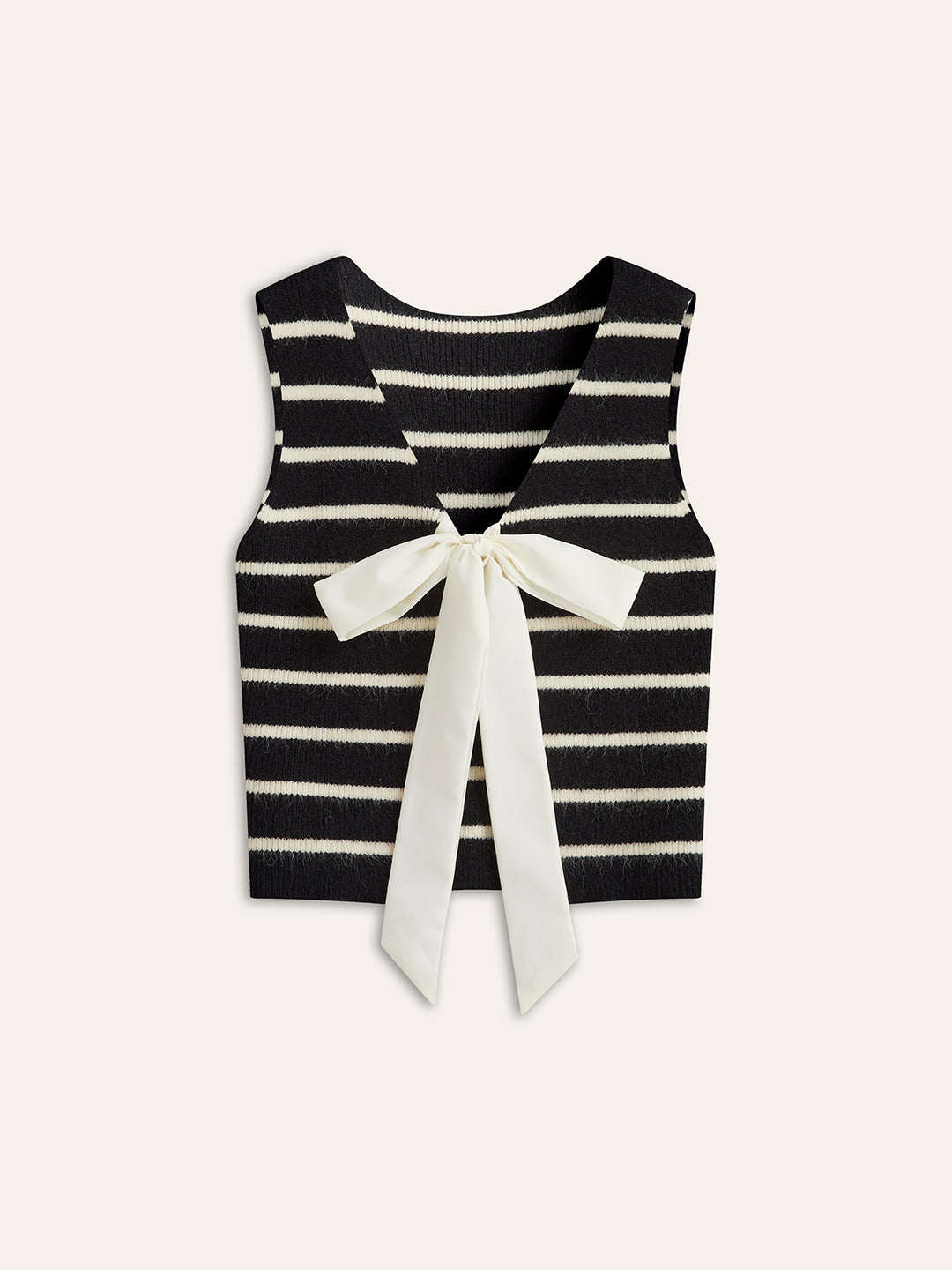 Sleeveless black and white striped knit top