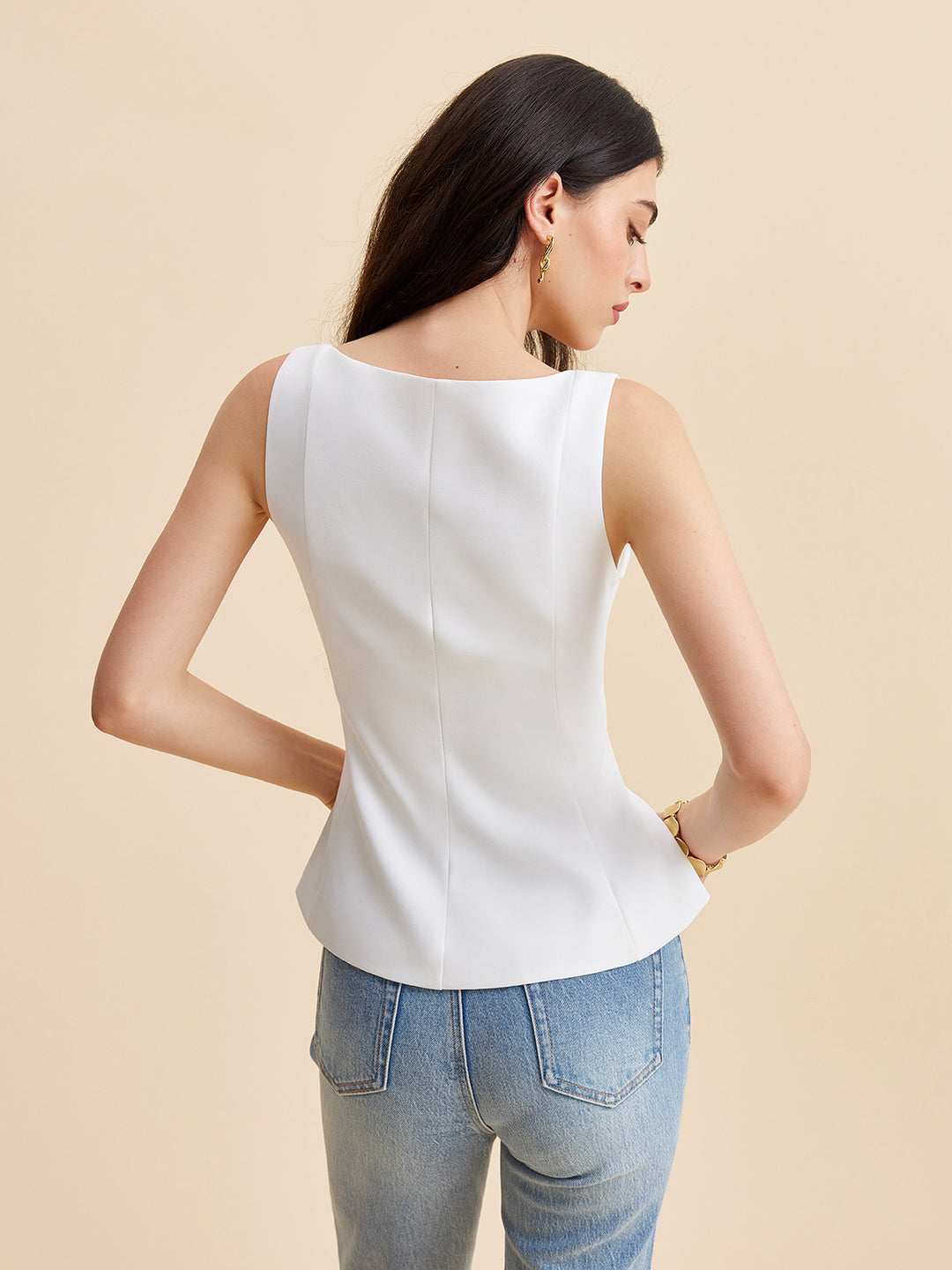 White corset top with structured peplum