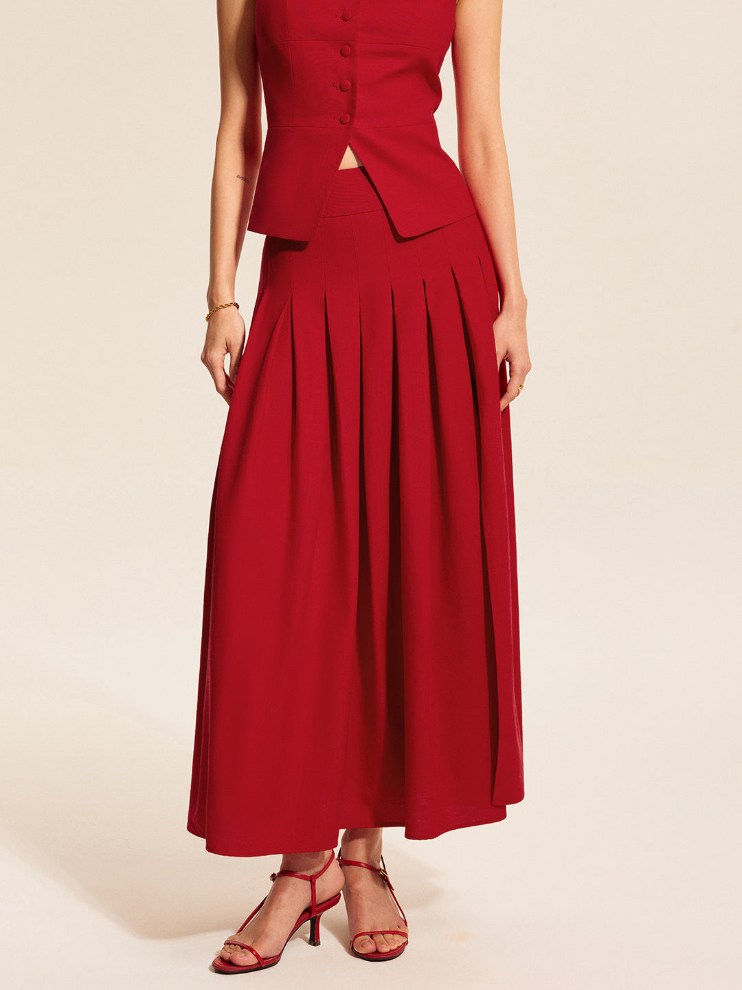 Red pleated flared midi skirt