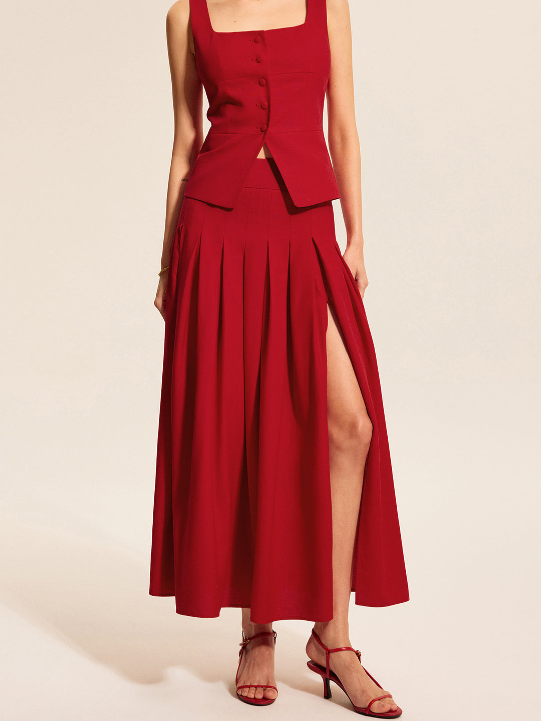 Red pleated flared midi skirt
