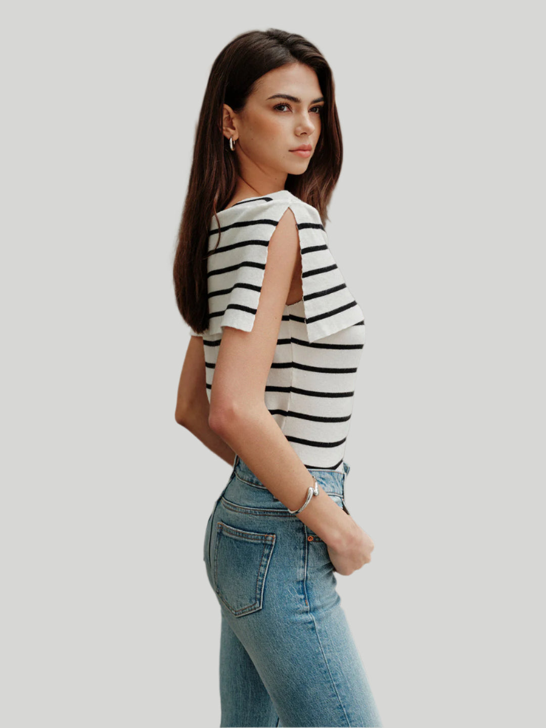 Sleeveless striped boat neck knit top