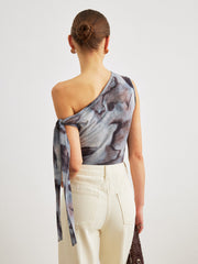 One-shoulder asymmetrical top with pattern and knots