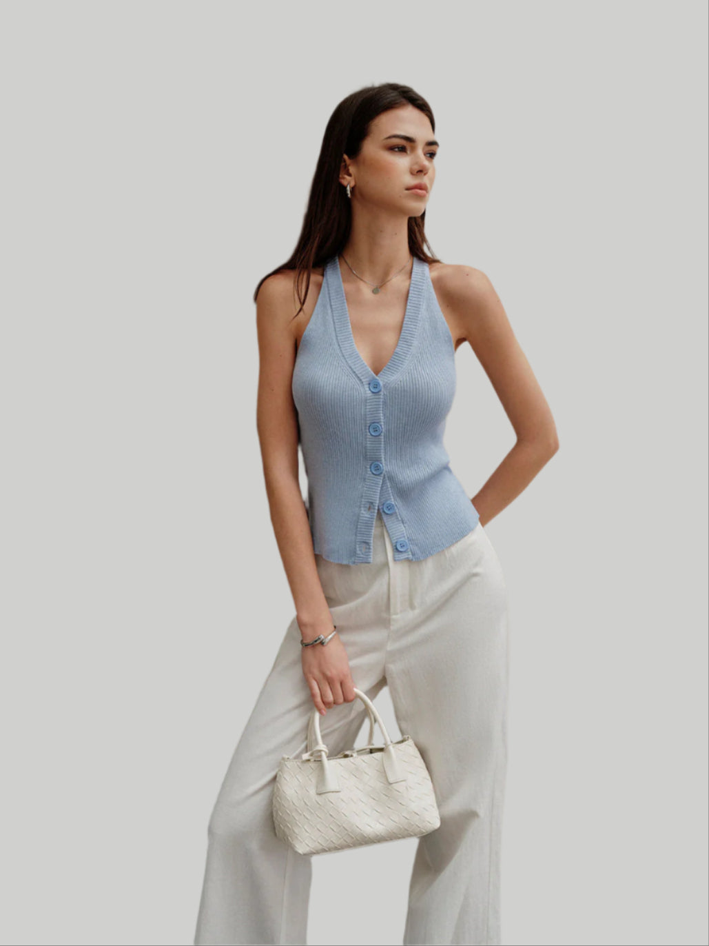 Blue ribbed sleeveless shirt with buttons