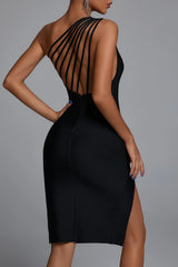 Black asymmetrical dress with straps and slit