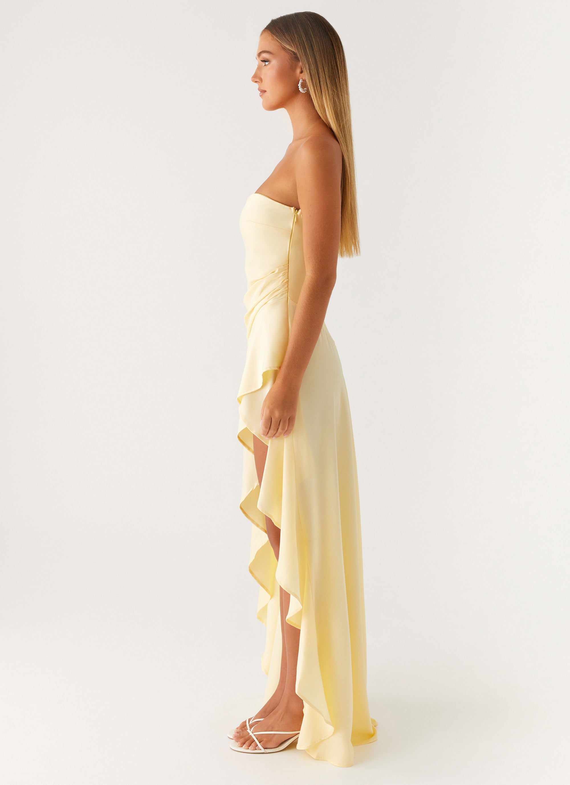 Light yellow strapless long dress with ruffles