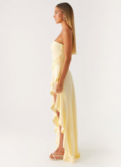 Light yellow strapless long dress with ruffles