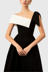 Black and white strapless asymmetrical midi dress
