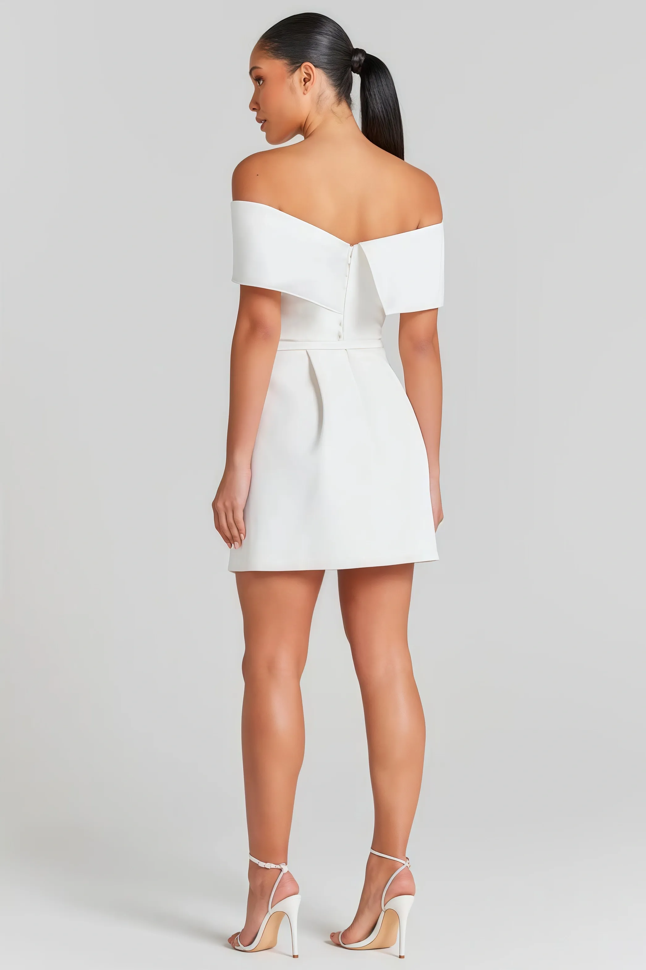White off-the-shoulder mini dress with belt