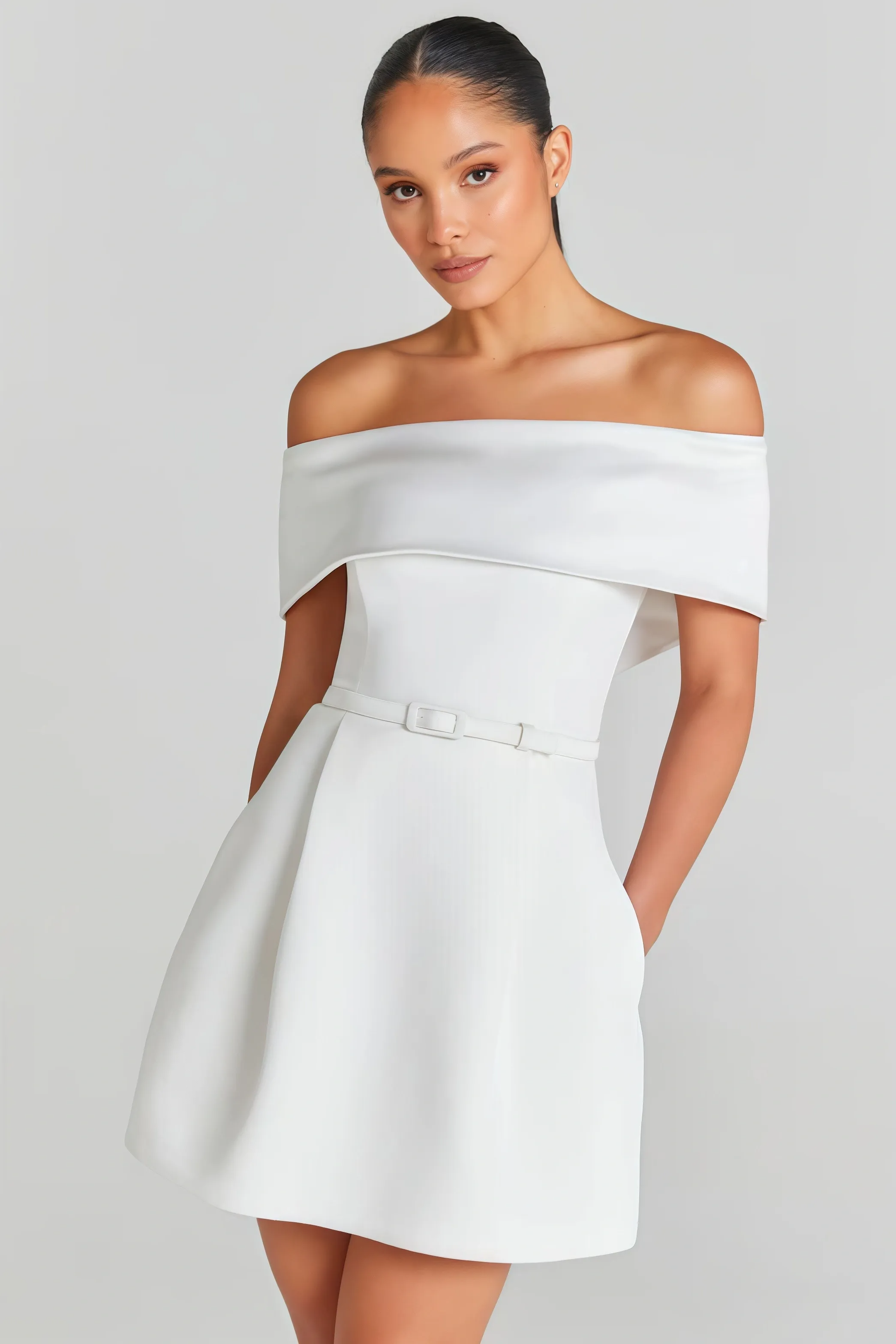 White off-the-shoulder mini dress with belt