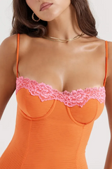 Orange mesh dress with pink lace trim
