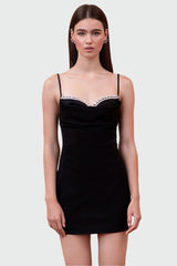 Black mini dress with pearl details