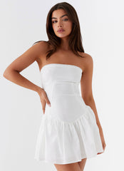 White strapless mini dress with ruffled skirt