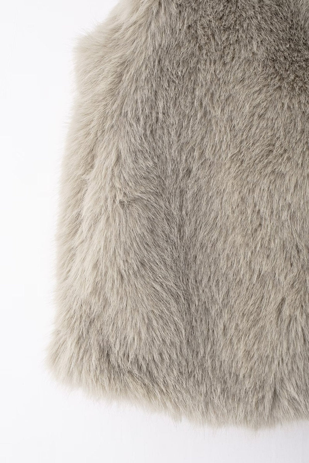 Ärmlös fransk väst i eco-päls