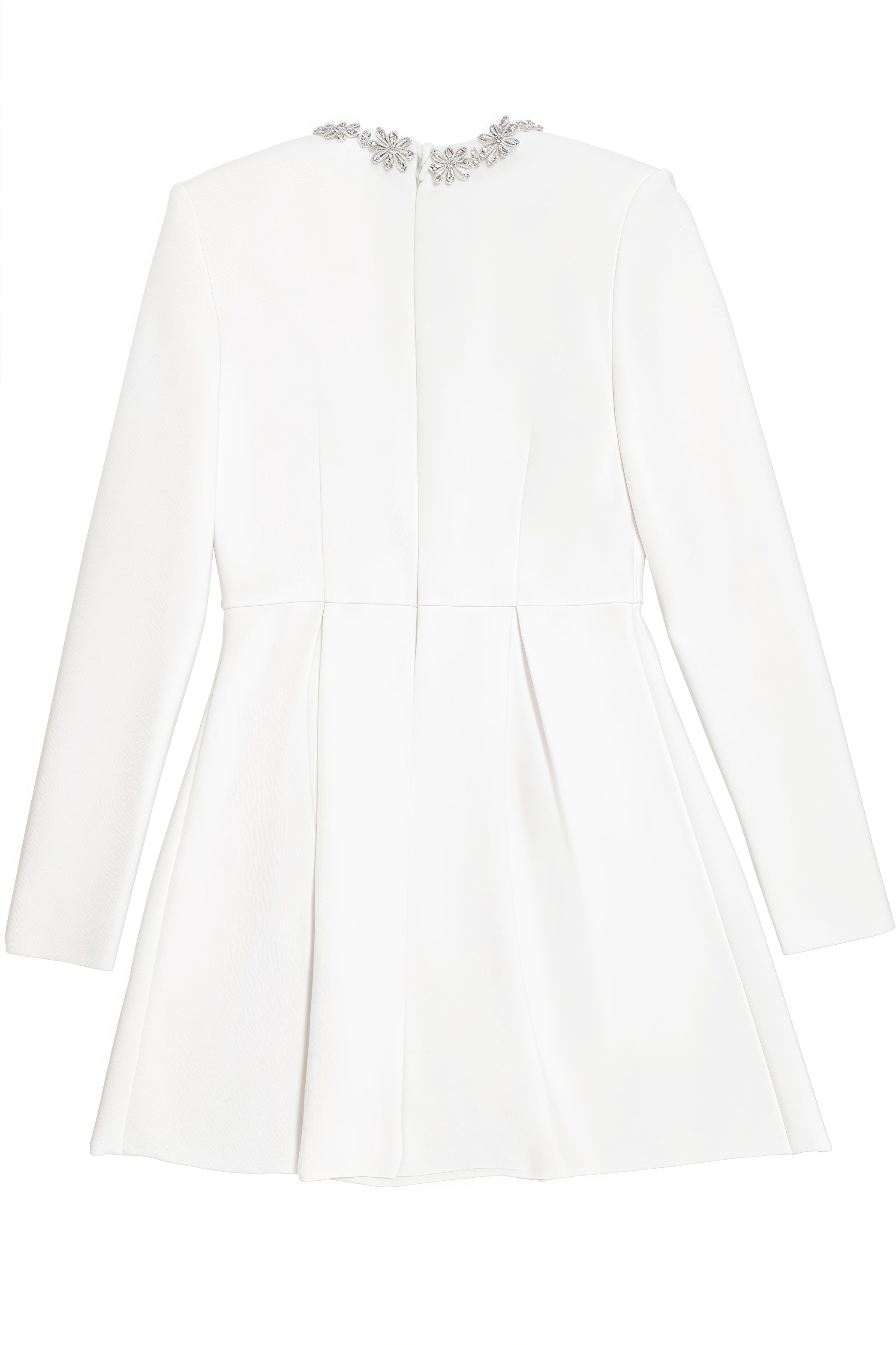 White mini dress with long sleeves and embellished square neckline